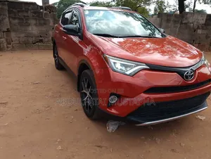 Toyota RAV4 SE FWD (2.5L 4cyl 6A) 2016 Orange