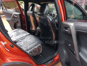 Toyota RAV4 SE FWD (2.5L 4cyl 6A) 2016 Orange