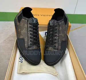 Louis Vuitton Slalom Low Top Monogram Sneakers.