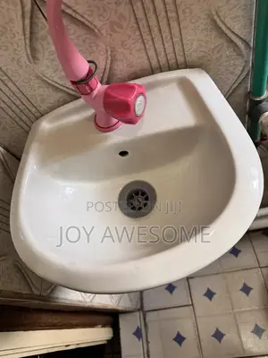 Neatly Used Wash Hand Basin With Tap