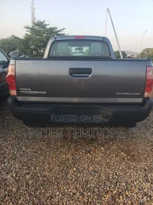 Toyota Tacoma 4dr Access Cab 4WD 6.1 ft. SB (2.7L 4cyl 4A) 2015 Gray