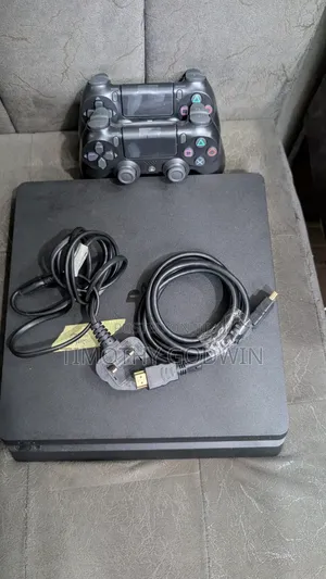 Uk Used Ps4 Slim With 13 Loaded Games and 2 Pads (1tb)