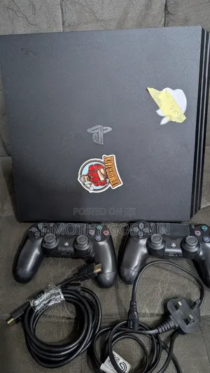Uk Used Ps4 Pro With 13 Games Installed and 2 Pads.