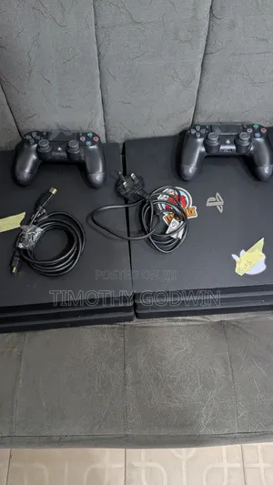 Foreign Used Ps4 Pro With 14 Loaded Games and 2 Pads