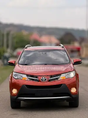 Toyota RAV4 XLE 4dr SUV AWD (2.5L 4cyl 6A) 2014 Orange