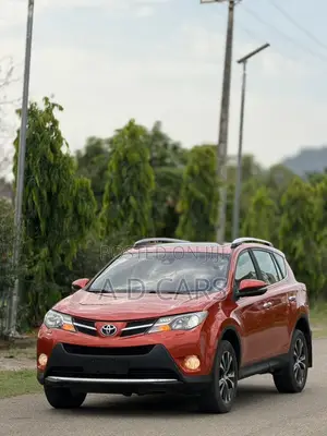 Toyota RAV4 XLE 4dr SUV AWD (2.5L 4cyl 6A) 2014 Orange