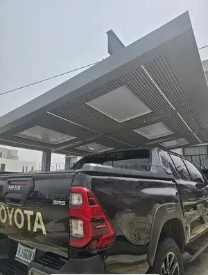 Contemporary Cladded With Light Modern Carport