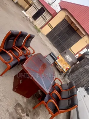 Imported Executive Conference Table With 7 Sturdy Padded Chairs