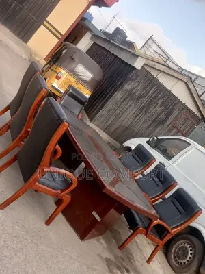 Imported Sturdy Conference Table With 7 Sturdy Padded Leather Chairs
