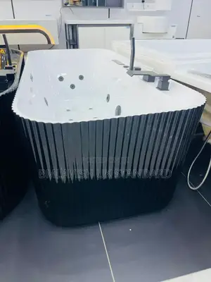 Single Jacuzzi With Black Accessories