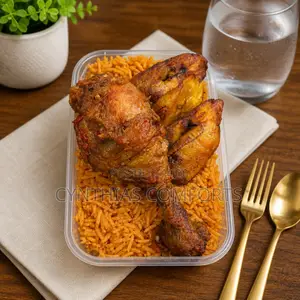 Fluffy Jollof Rice, Plantain and Chicken