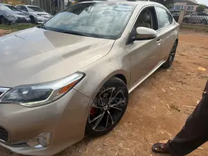 Toyota Avalon Limited 4dr Sedan (3.5L 6cyl 6A) 2014 Gold