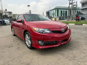 Toyota Camry SE 4dr Sedan w/Prod. End 11/13 (2.5L 4cyl 6A) 2014 Red