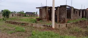 100 by 100 With Uncompleted Building for Sale