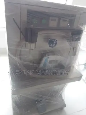 Filling Machine
Liquid Filler
Bottle Filler
