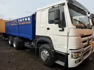 Howo Truck With Trailer Back.