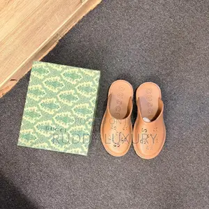 Gucci Elea Rubber Platform Mules