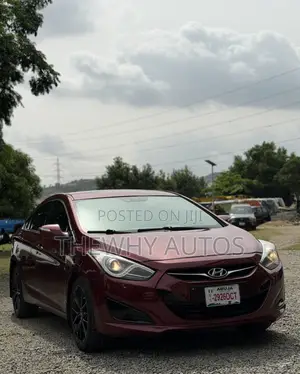 Hyundai Accent SE 4dr Hatchback (1.6L 4cyl 6M) 2014 Maroon