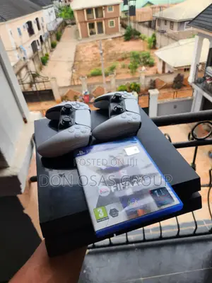 Unhacked Ps4 Fat With 2 Working Pads, 2 Cds(Fifa 23 and Mafia 3)
