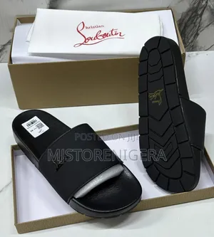 Black Christian Louboutin Branded Slides.