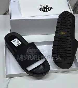 Black Palm Angels Monogram Slides With a Thick, Ridged Sole.