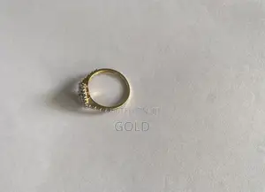 Genuine 1-Carat Natural Diamond Pear-Shaped Cluster Ring in Gold.