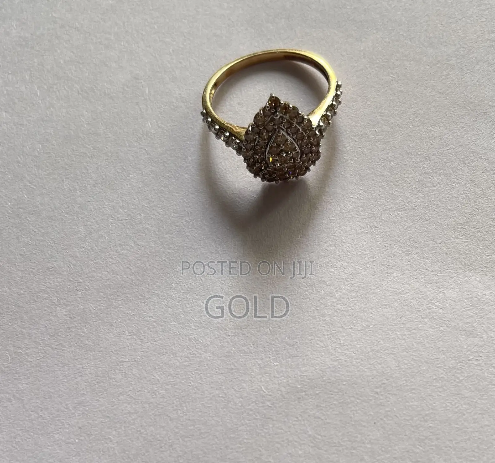 Genuine 1-Carat Natural Diamond Pear-Shaped Cluster Ring in Gold.