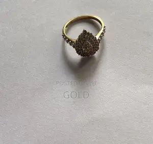 Genuine 1-Carat Natural Diamond Pear-Shaped Cluster Ring in Gold.