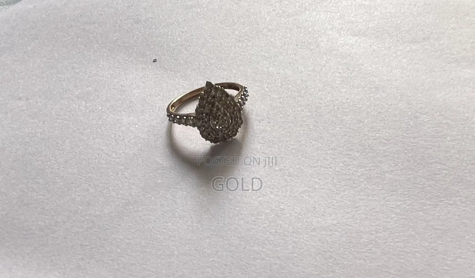 Genuine 1-Carat Natural Diamond Pear-Shaped Cluster Ring in Gold.