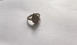 Genuine 1-Carat Natural Diamond Pear-Shaped Cluster Ring in Gold.