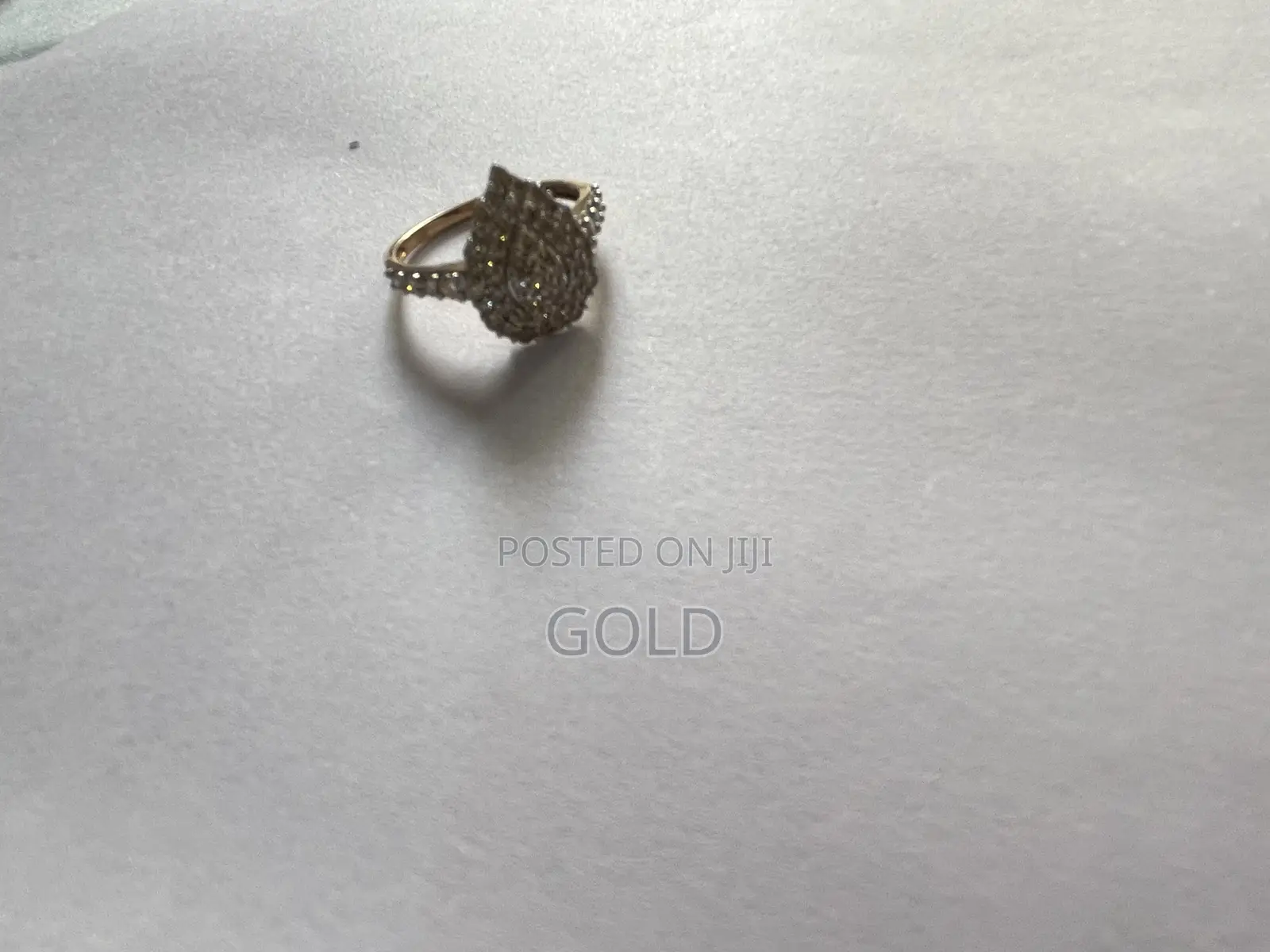 Genuine 1-Carat Natural Diamond Pear-Shaped Cluster Ring in Gold.