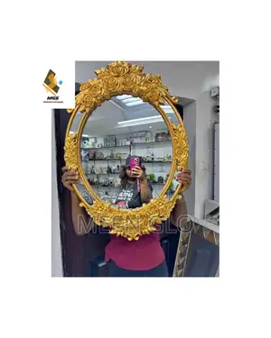 Ornate Oval Wall Mirror With Rose Design