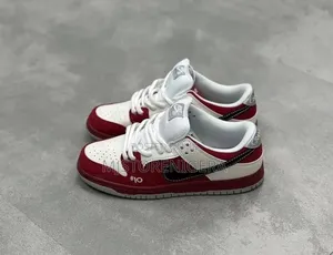 Nike Sb Dunk Low Roller Derby Sneakers in Red, White, and Black