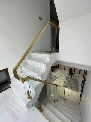 Plain Glass Handrail With Gold Fittings