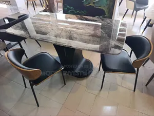 Exotic Dining Table Set by 6 Chairs.