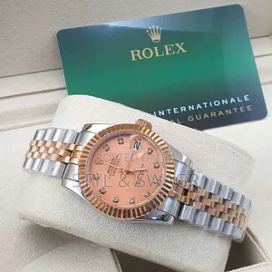 Silver and Rose Gold Rolex Watch