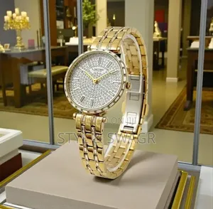 Keep Moving Ladies Gold Chain Watch