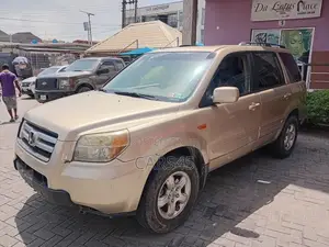 Honda Pilot LX 4x4 (3.5L 6cyl 5A) 2006 Gold