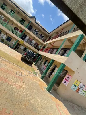 For Sale Functioning Pry and Sec School at Ayobo on One and Half Plot.