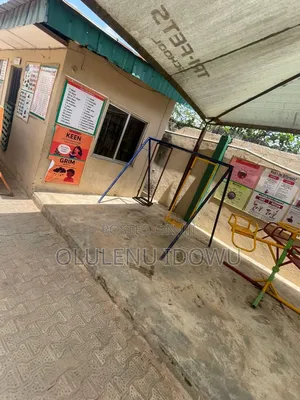 For Sale Functioning Pry and Sec School at Ayobo on One and Half Plot.
