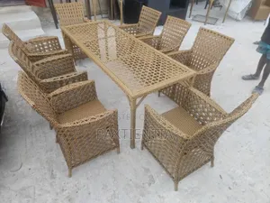 Eight-Seater Rattan Outdoor Chairs With Centre Table