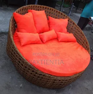 Round Rattan Pillowed Sofa