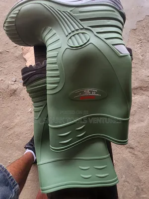 Green Trucker Safety Rain Boots Designed for Wet Environments