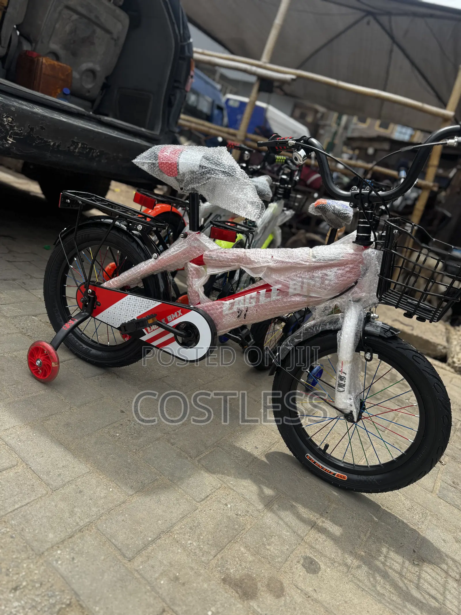 Eagle BMX Children's Bicycle Featuring Training Wheels, a Front Basket