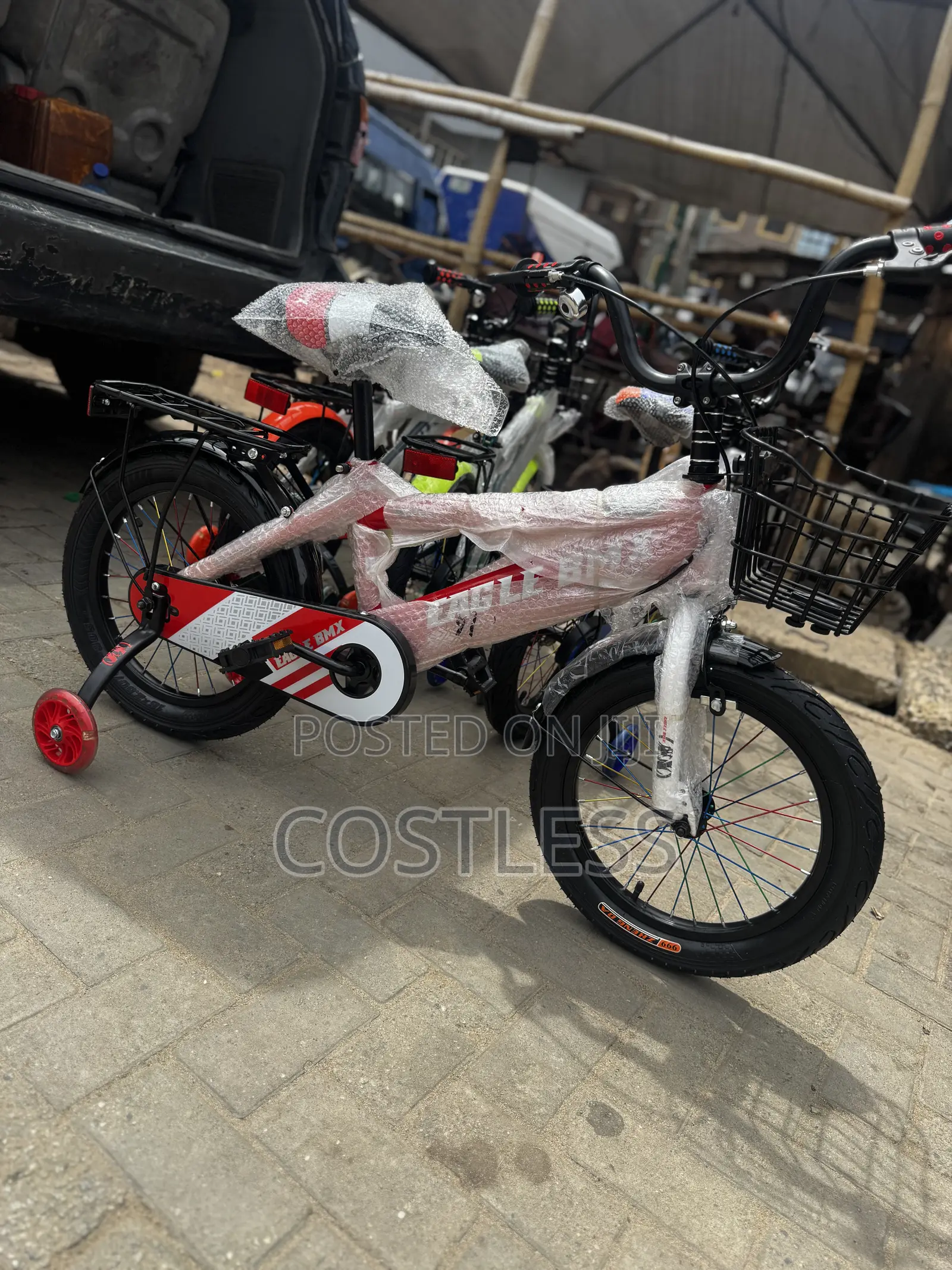 Eagle BMX Children's Bicycle Featuring Training Wheels, a Front Basket