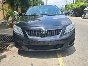 Toyota Corolla Base 4dr Sedan (1.8L 4cyl 5M) 2010 Black
