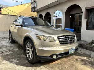 Infiniti FX35 Base 4x4 (3.5L 6cyl 5A) 2004 Gold