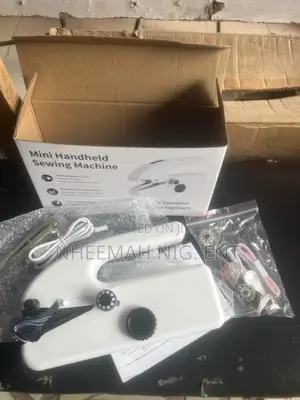 Mini Hand Held Sewing Machine