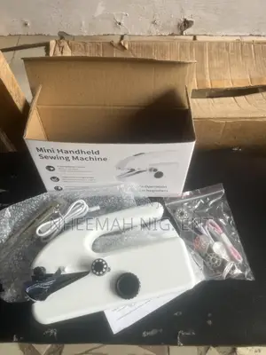 Mini Hand Held Sewing Machine