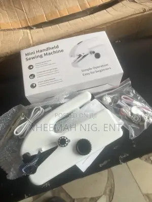 Mini Hand Held Sewing Machine
